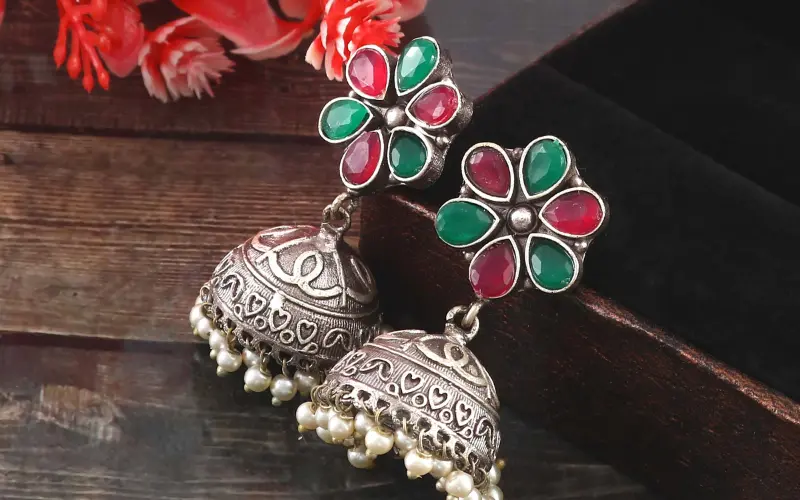 Artificial earrings in jhumka and stud styles, perfect for gifting on Rakhi